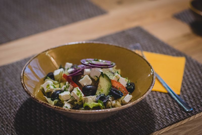 Italian Chopped salad with olives, salami and pepperoncini