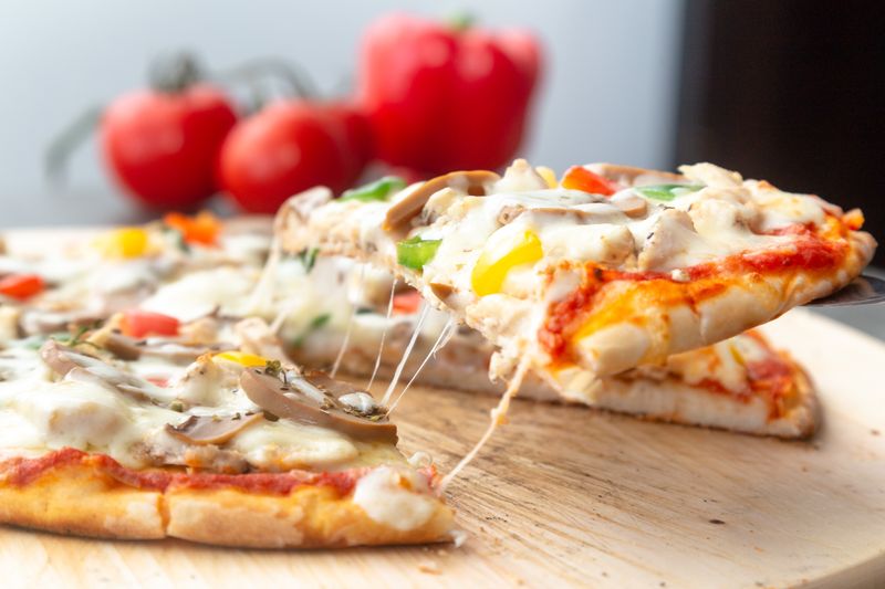 Build your own 10 inch personal pizza at Dewey's